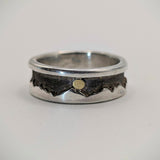 Sterling Silver with gold nugget sun ring with a textured design on a light gray background.