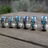 Sterling Silver Rings with Turquoise and Lapis Inlay On Table