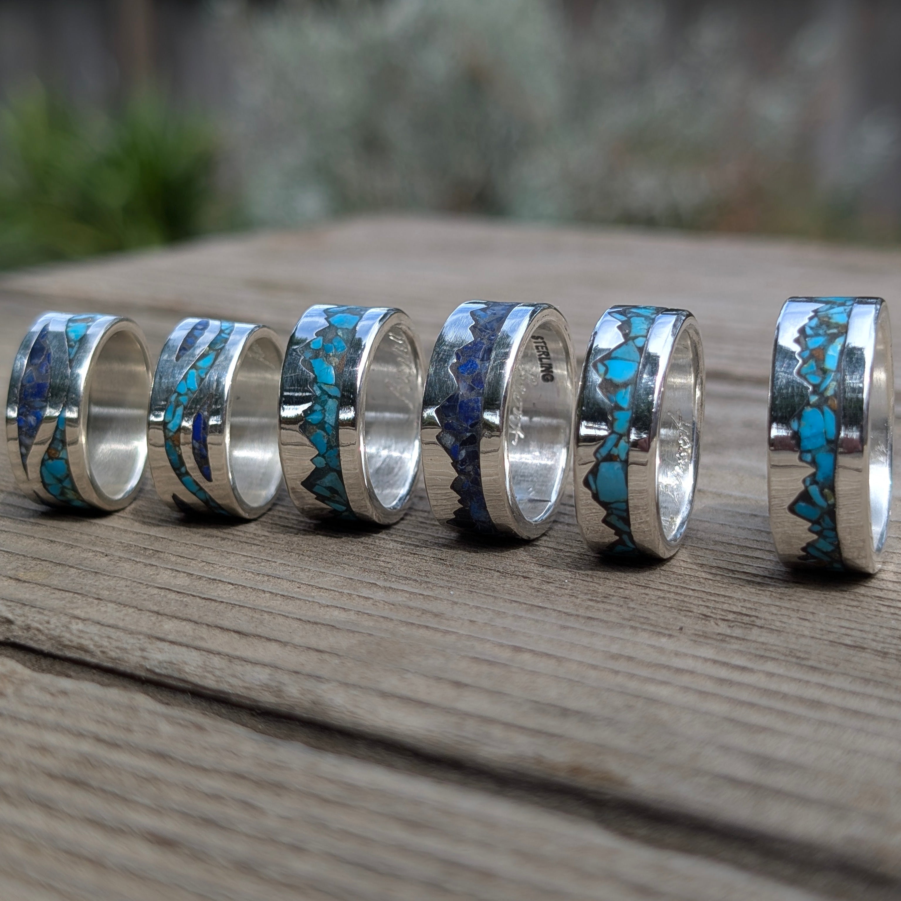 Sterling Silver Rings with Turquoise and Lapis Inlay On Table
